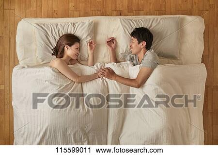 Japanese couple in bed View Large Photo Image Stock Image - Japanese couple in bed. Fotosearch