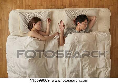 Japanese couple in bed View Large Photo Image Stock Photo - Japanese couple in bed. Fotosearch