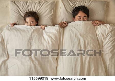 Japanese couple in bed View Large Photo Image Stock Photo - Japanese couple in bed. Fotosearch