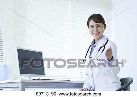 Japanese doctor at work View Large Photo Image Stock Image - Japanese doctor at work. Fotosearch