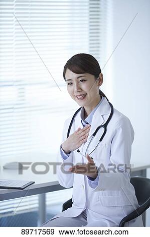 Stock Photo - Japanese doctor at work. Fotosearch