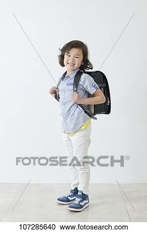 Stock Image - Japanese elementary school kid. Fotosearch