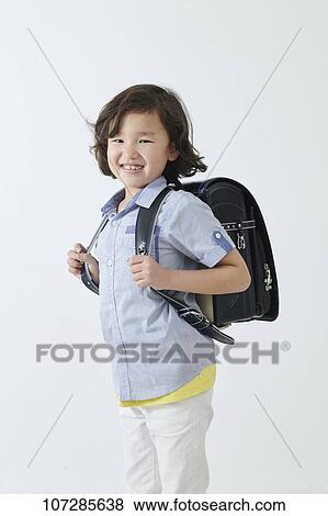 Stock Photo - Japanese elementary school kid. Fotosearch