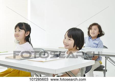 Stock Image - Japanese elementary school kids. Fotosearch