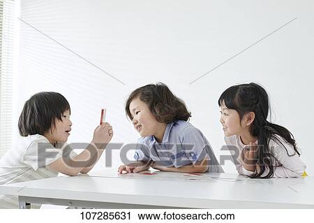 Stock Image - Japanese elementary school kids. Fotosearch