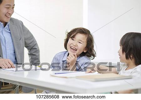 Japanese elementary school kids with teacher View Large Photo Image Stock Photo - Japanese elementary school kids with teacher. Fotosearch