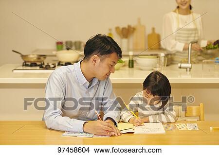 Picture - Japanese family at home. Fotosearch