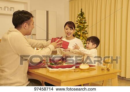 Picture - Japanese family at home. Fotosearch