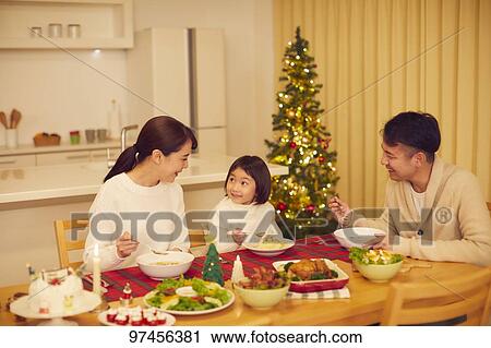 Stock Image - Japanese family at home. Fotosearch
