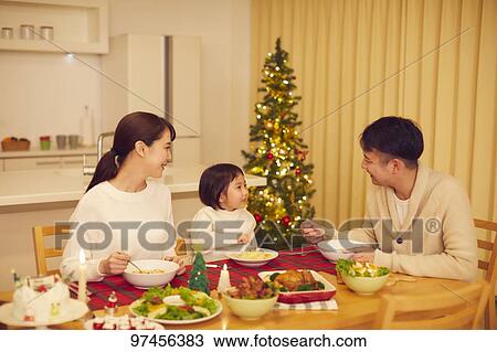 Stock Image - Japanese family at home. Fotosearch