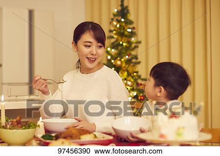 Stock Image - Japanese family at home. Fotosearch