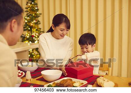 Stock Image - Japanese family at home. Fotosearch