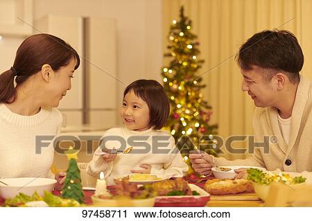 Stock Image - Japanese family at home. Fotosearch