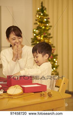 Stock Image - Japanese family at home. Fotosearch