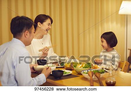 Stock Photo - Japanese family at home. Fotosearch