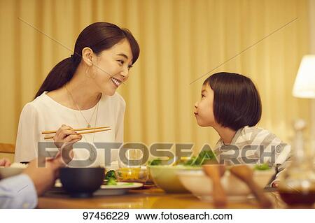 Stock Photo - Japanese family at home. Fotosearch