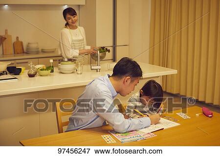 Stock Photo - Japanese family at home. Fotosearch