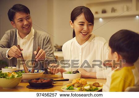 Stock Photo - Japanese family at home. Fotosearch