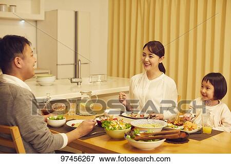 Stock Photo - Japanese family at home. Fotosearch