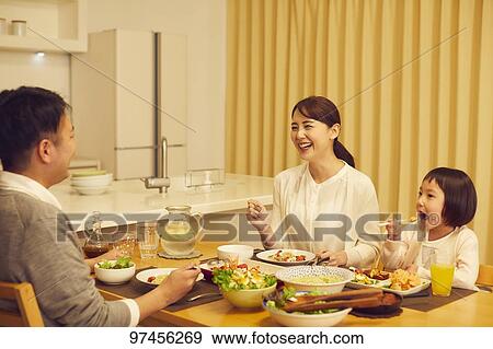 Stock Photo - Japanese family at home. Fotosearch