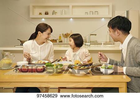Stock Photo - Japanese family at home. Fotosearch