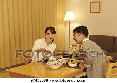 Stock Photo - Japanese family at home. Fotosearch