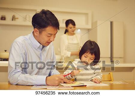 Stock Photography - Japanese family at home. Fotosearch