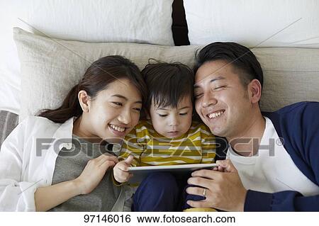 Japanese family View Large Photo Image Stock Photograph - Japanese family. Fotosearch
