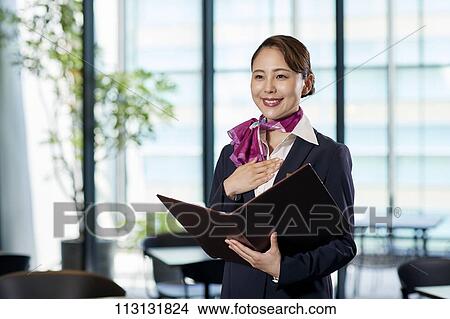 Picture - Japanese Flight Attendant. Fotosearch