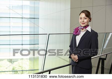 Stock Image - Japanese Flight Attendant. Fotosearch