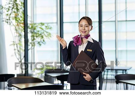 Stock Photo - Japanese Flight Attendant. Fotosearch