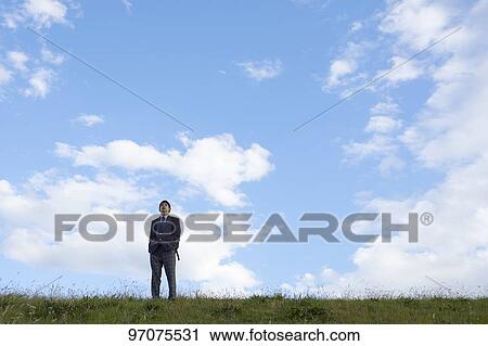 Stock Image - Japanese high school student in uniform outdoors. Fotosearch