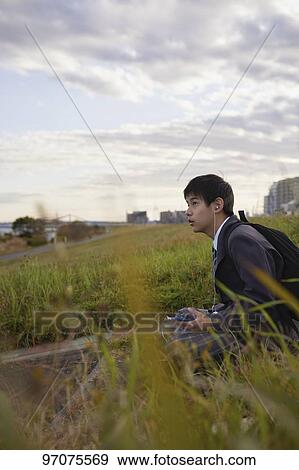 Japanese high school student in uniform outdoors View Large Photo Image Stock Photo - Japanese high school student in uniform outdoors. Fotosearch