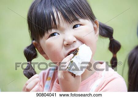 Japanese kid at a city park View Large Photo Image Stock Image - Japanese kid at a city park. Fotosearch
