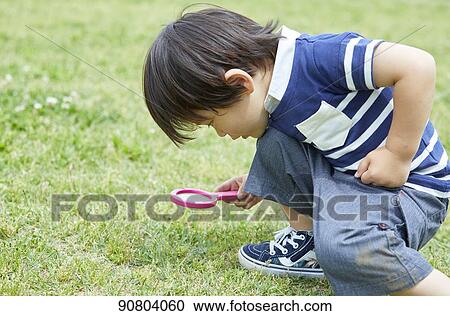 Japanese kid at a city park View Large Photo Image Stock Image - Japanese kid at a city park. Fotosearch