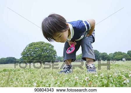 Japanese kid at a city park View Large Photo Image Stock Image - Japanese kid at a city park. Fotosearch