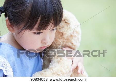Stock Photo - Japanese kid at a city park. Fotosearch