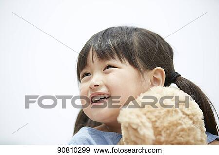 Japanese kid at a city park View Large Photo Image Stock Photo - Japanese kid at a city park. Fotosearch