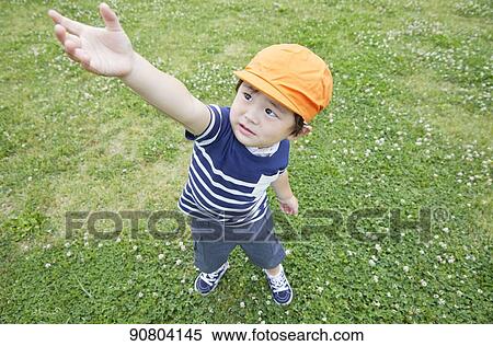 Japanese kid at a city park View Large Photo Image Stock Photography - Japanese kid at a city park. Fotosearch
