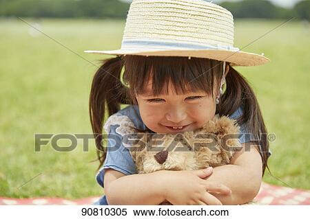 Stock Photography - Japanese kid at a city park. Fotosearch
