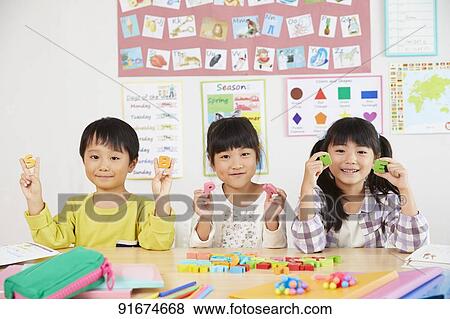 Stock Photo - Japanese kids in the classroom. Fotosearch