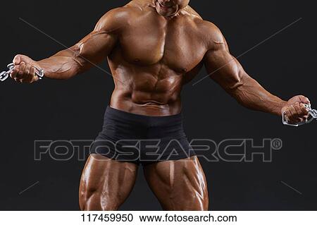 Stock Image - Japanese male bodybuilder. Fotosearch