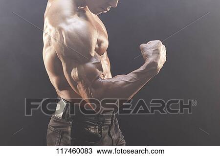 Stock Image - Japanese male bodybuilder. Fotosearch