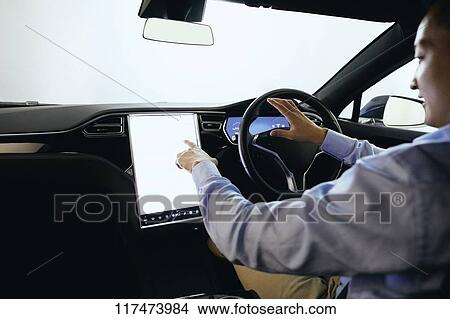 Japanese man in self driving car View Large Photo Image Picture - Japanese man in self driving car. Fotosearch
