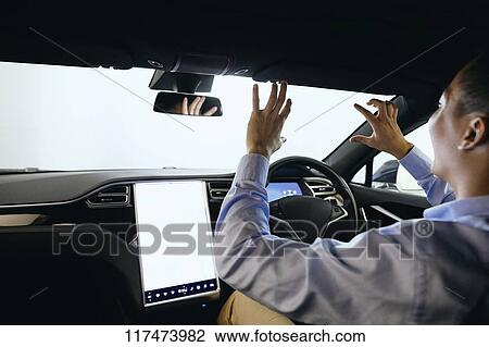 Japanese man in self driving car View Large Photo Image Stock Image - Japanese man in self driving car. Fotosearch
