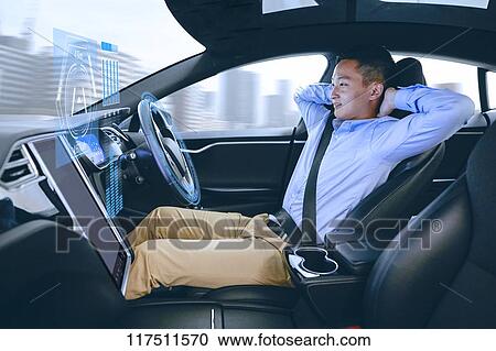 Japanese man in self driving car View Large Photo Image Stock Image - Japanese man in self driving car. Fotosearch