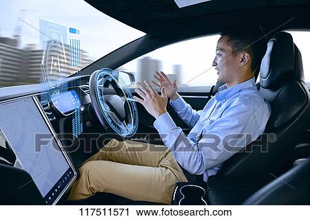 Japanese man in self driving car View Large Photo Image Stock Image - Japanese man in self driving car. Fotosearch