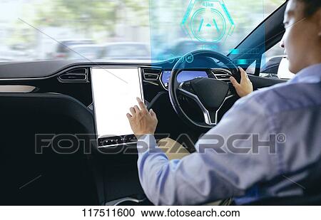 Japanese man in self driving car View Large Photo Image Stock Image - Japanese man in self driving car. Fotosearch