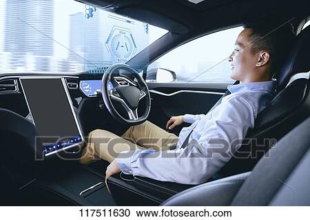 Japanese man in self driving car View Large Photo Image Stock Image - Japanese man in self driving car. Fotosearch