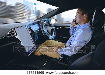 Japanese man in self driving car View Large Photo Image Stock Photo - Japanese man in self driving car. Fotosearch